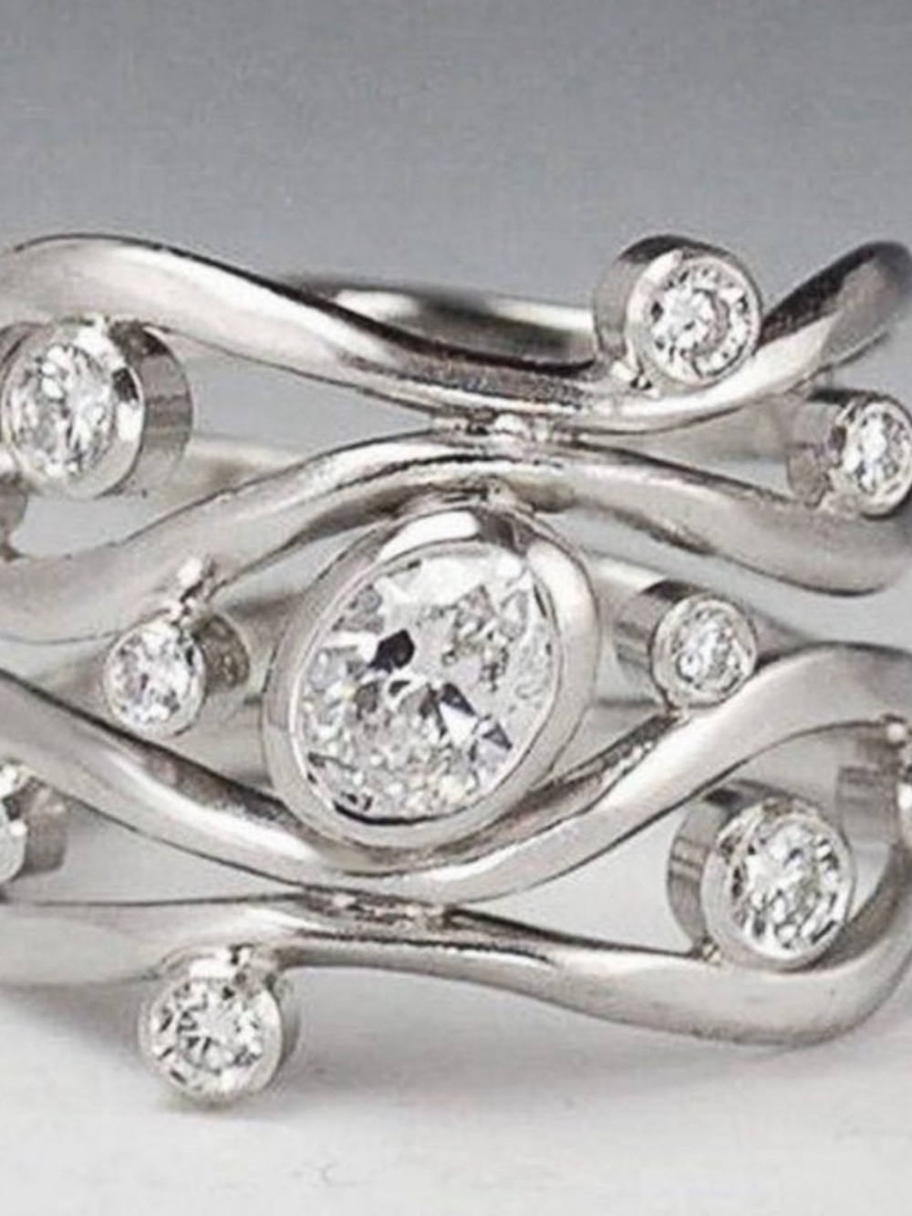NEW 18K White Gold Diamond
Twisted Wave Wide Ring